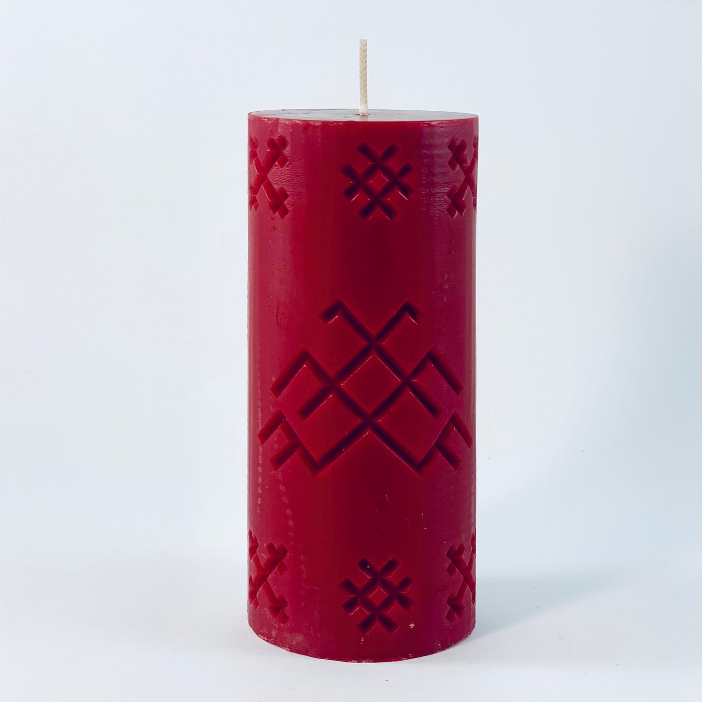 Soy wax candle with Latvian rune "Jumis", burgundy